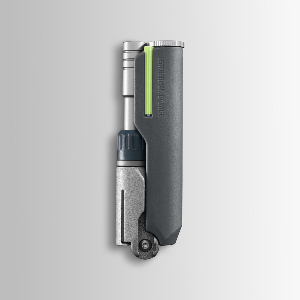 Translation missing: de.Batch #009: Adapter multi-tool in folded form with gray body, metal tip, and neon green accent