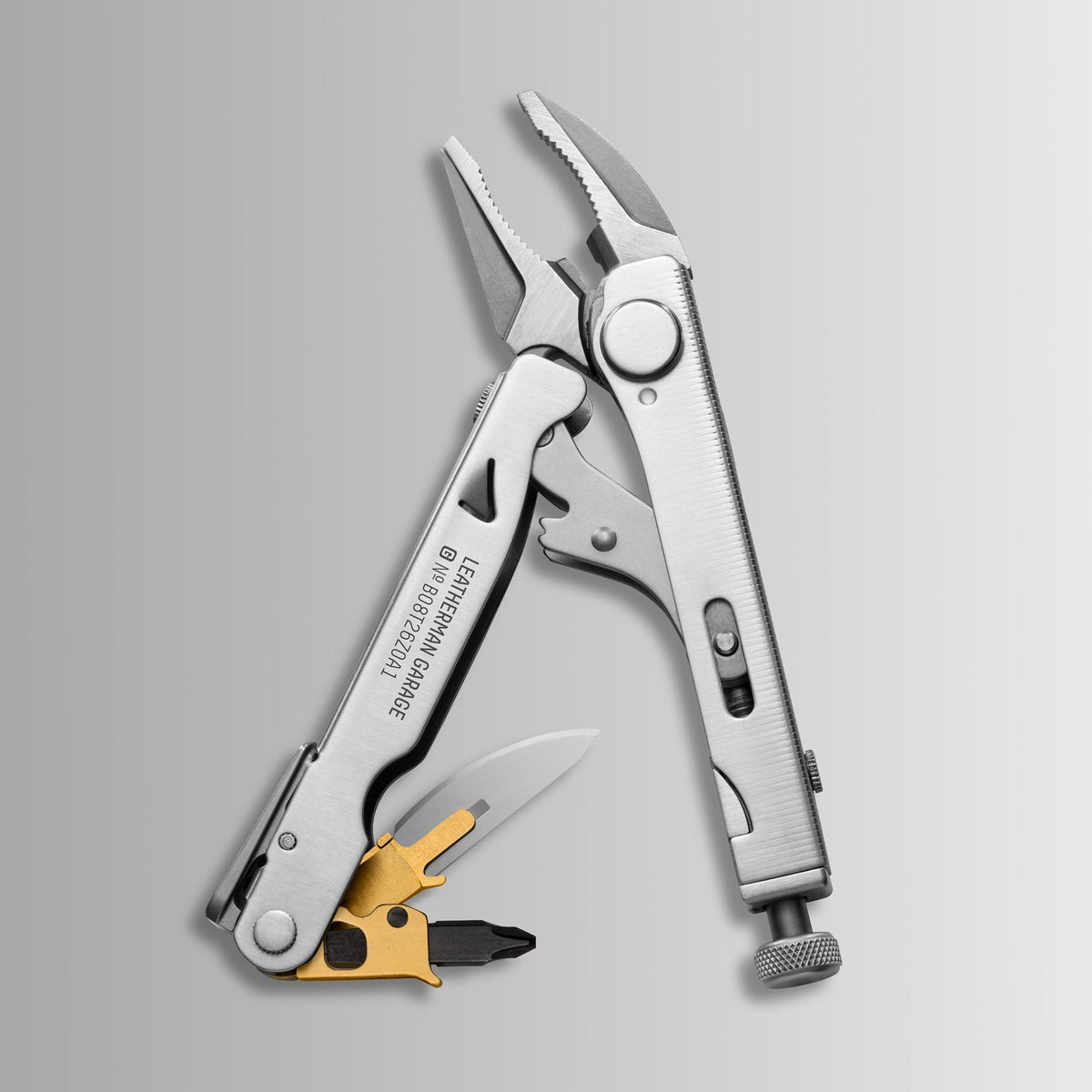 Translation missing: fr.Batch #008: Captain's Crunch multitool with open pliers, knife blade, and gold bit holder showing interchangeable driver bits