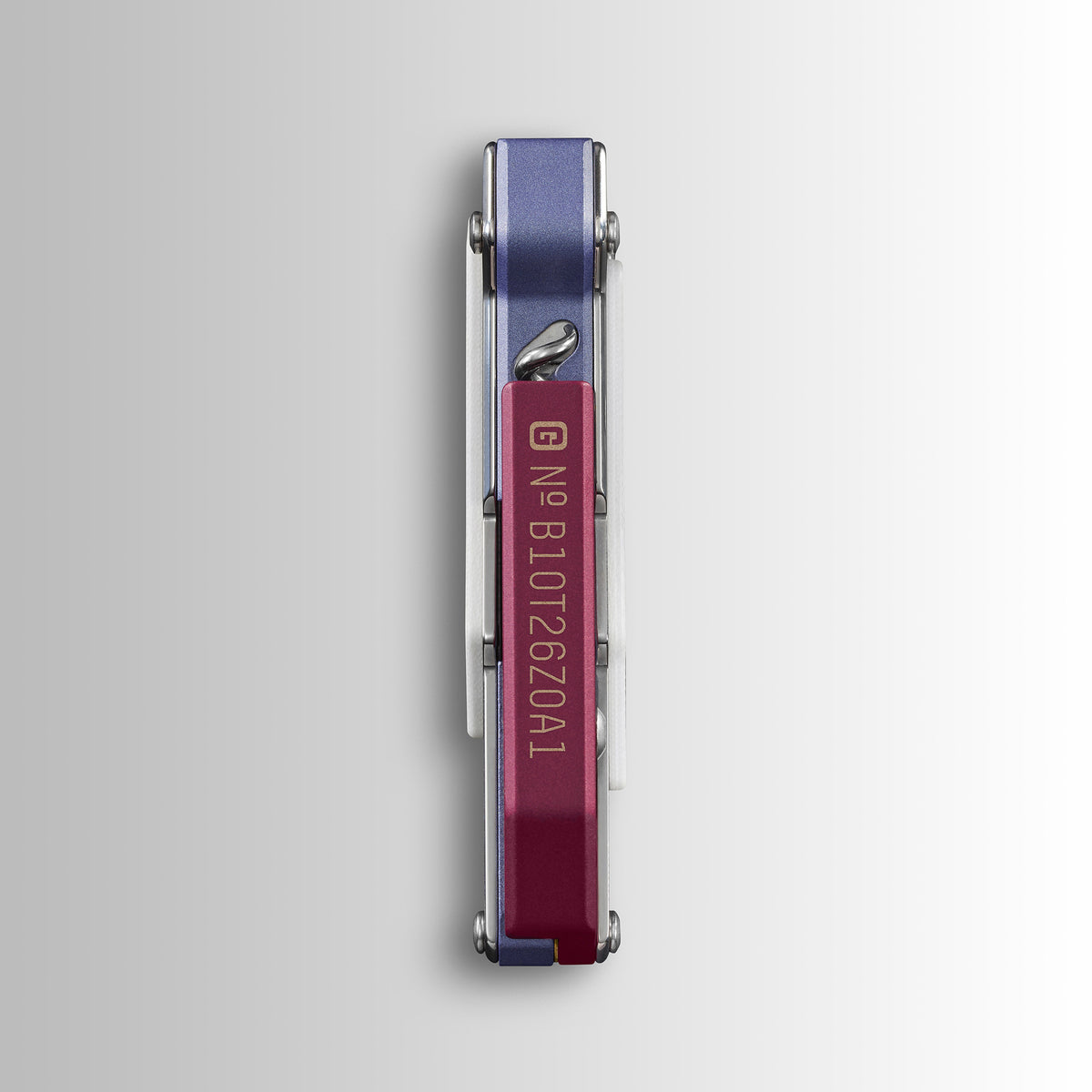 Translation missing: de.Garage Batch 010: Picnic closed folding knife with red handle viewed from the spine, showing engraved serial code