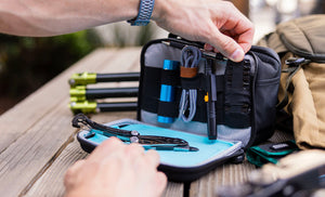 Translation missing: de.Man pulling bit kit from Leatherman® Adapt Kit