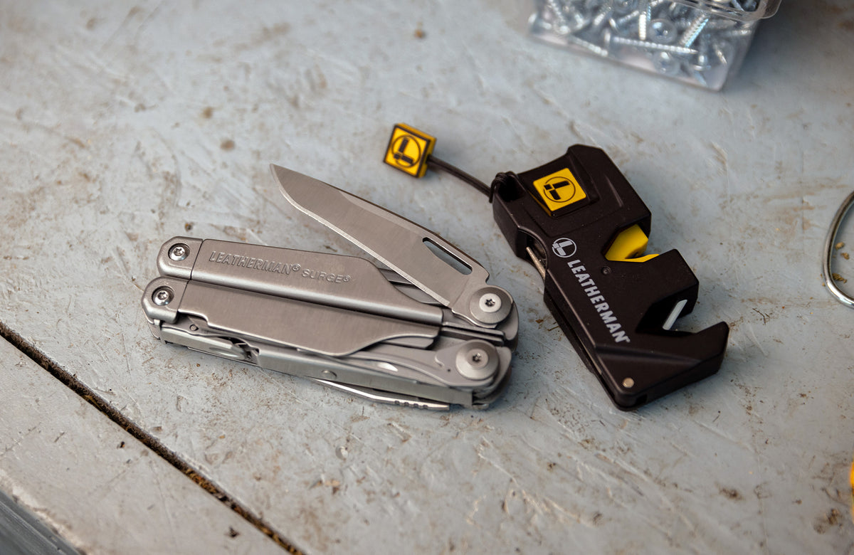 Translation missing: fr.Leatherman Surge with blade opened next to Leatherman Blade Sharpener