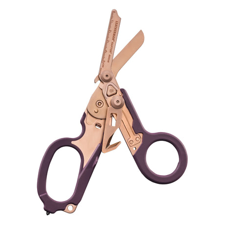 Translation missing: de.Raptor® Rescue shears in Rose Gold with purple handles, shown open to display blades and integrated tools