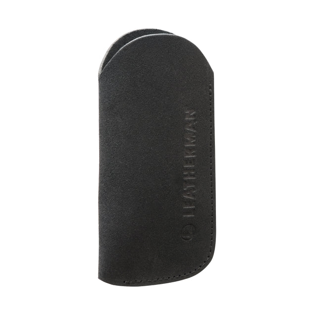 Translation missing: de.A black suede leather tool sleeve featuring an embossed vertical “LEATHERMAN” logo and the company’s circular emblem near the stitched edge, displayed against a white background